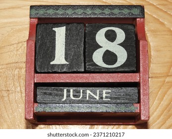 Today's date calendar red and black cubes June 18 - Father's Day - Powered by Shutterstock