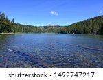 Todd Lake, Oregon, with Broken Top in background on a clear sunny summer afternoon.