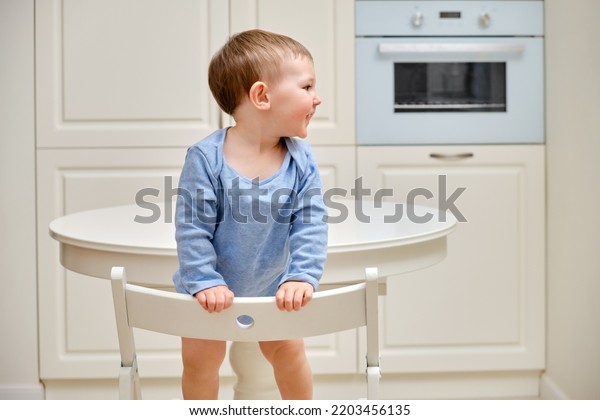 11 Toddler Climbing Onto Chair Images, Stock Photos & Vectors ...