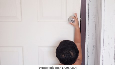 Toddler Baby Hands Kid Reaching Up Try To Open Or Close Door Knob, Child Want To Escape To Play, Explore Outdoor, Security And Safety Concept.