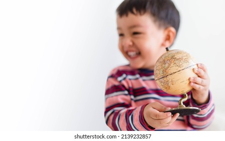 Toddler Baby Kid And Earth Day.World Environment Day.Kid Hands Holding Earth Globe Banner Isolated Background.CSR.research, Discovery, Planet, Go Green.Climate Change.human Children Child Discovery.