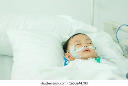 Toddler Boy In Intensive Care Unit Or Icu.Monkeypox Infection In UK And 
 US.Toddler Boy Wearing Oxygen Tube In Hospital.Sick
Patient Child Baby Boy In Icu Bed With Fever In Hospital.medical Health.