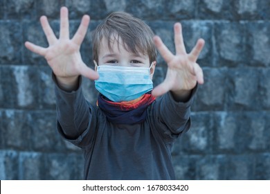 Toddler Child  Wearing Medical Mask Say Stop War In Ukraine. Stop Occupation 