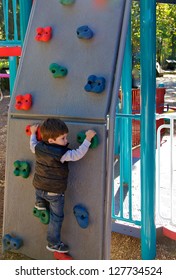 Toddler Climbing And Outdoor Rock Wall