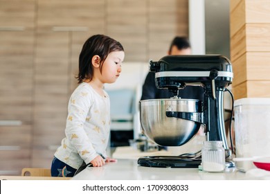 Toddler Girl Baking With Standup Mixer