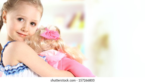 Toddler Girl With Doll