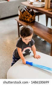 Toddler Girl Exploring Furniture Show Room