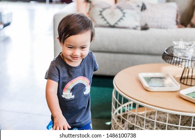 Toddler Girl Exploring Furniture Show Room