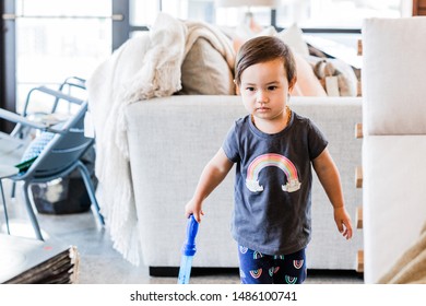 Toddler Girl Exploring Furniture Show Room