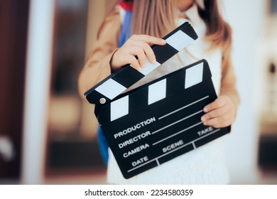 
Toddler Girl Holding a Film Slate interested in Acting Lessons. Little wannabe female director holding a film slate
 - Shutterstock ID 2234580359