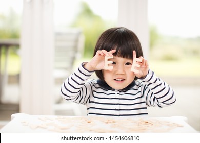 Toddler Girl Learning Alphabet Letter At Home 