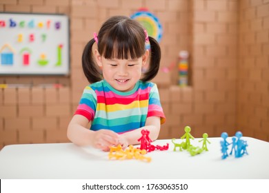 Toddler Girl Learning Counting And Math For Homeschooling