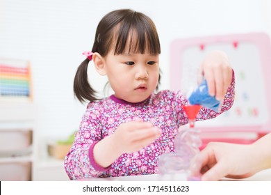 toddler girl making sand animal crafts for homeschooling - Powered by Shutterstock