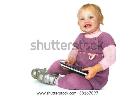 toddler girl with psp sitting