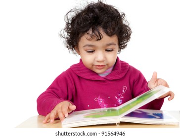 Toddler Girl Reading A Picture Book, Isolated, White