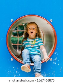 Toddler Girl Sitting In Tube  – Gelsenkirchen, NRW, Germany