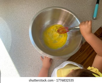 Toddler Helping Parents To Bake, Baking With Kids, Mixing Batter