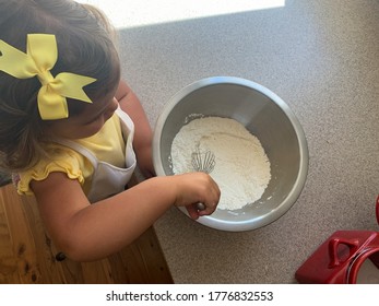 Toddler Helping Parents To Bake, Baking With Kids, Mixing Batter