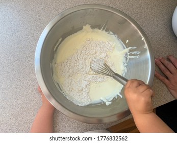 Toddler Helping Parents To Bake, Baking With Kids, Mixing Batter