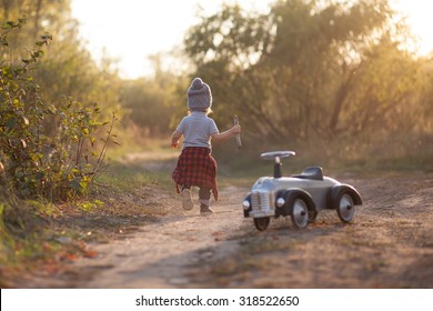 Toddler Running During Park Stroll