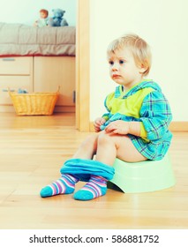 Toddler Sitting On Green Potty Home Stock Photo 586881752 | Shutterstock