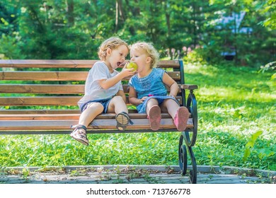 14,099 Boy And Girl Sitting In The Garden Images, Stock Photos ...