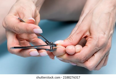 Toe Nails Cutting With Nail Clippers, Pedicure Concept