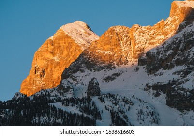 Tofana di Rozes or Tofana I Peak in Cortina d'Ampezzo in Winter at Dawn, Snow Covered at Sunrise with Early Morning Light with Ski Slopes - Shutterstock ID 1638616603