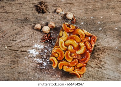 Toffee Almond Nut Cake On Wooden Background,homemade Bakery