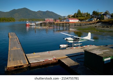 Tofino, British Columbia, Canada – March 31, 2019. Floatplane Dock in Tofino Canada. A floatplane tied to the dock in Tofino. Tofino, British Columbia, Canada.

                               