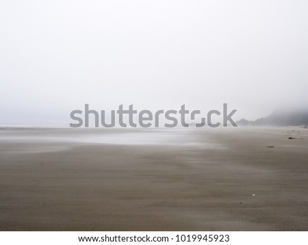 Tofino, Combers beach, in the fog - June 30/2017 - looking north.  Thick fog blends the ocean to the sky.