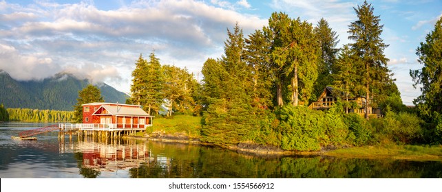 Tofino Harbour, Vancouver Island. British Columbia, Canada. Clayoquot Sound Inlets on background and red dock house on foreground.