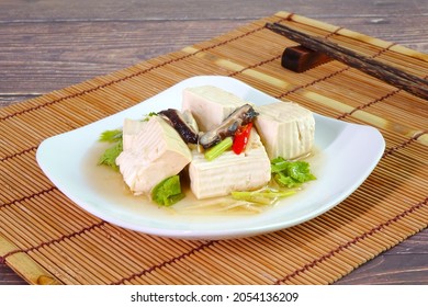 Tofu. Steamed White Tofu With Soy Sauce. Chinese Traditional Vegetarian Food.