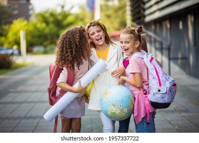  Together Again. Portrait Of Three School Girls Standing Outside. 