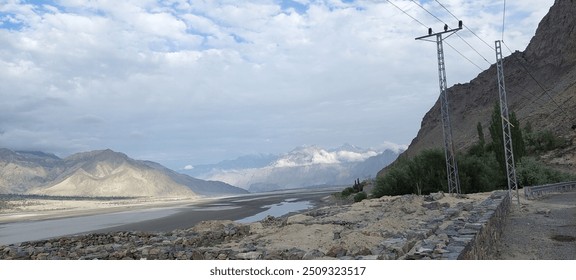 Together, the mountain, river, and clouds create a symphony of serenity, a haven of peace and tranquility. The mountain's solidity and strength, the river's fluidity and grace, and the clouds' etherea