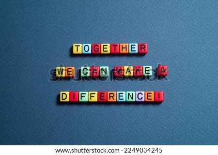 Together we can make a difference - word concept on cubes, text,letters