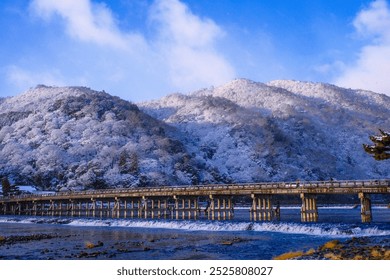 Togetsukyo Bridge in snowy winter - Powered by Shutterstock