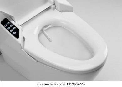 Toilet bowl with electronic high technology. White toilet bowl. Japan toilet electronic control bidet.