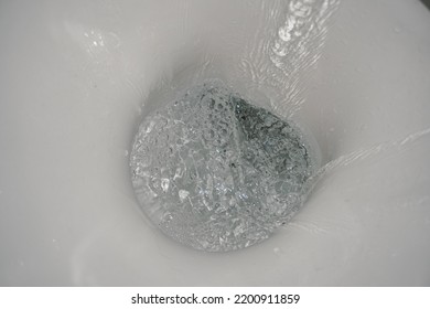  Toilet Bowl Flush. Water Splash. Water Flushes Down Toilet Bowl. Water Close-up. Toilet. Toilet In Bathroom.
