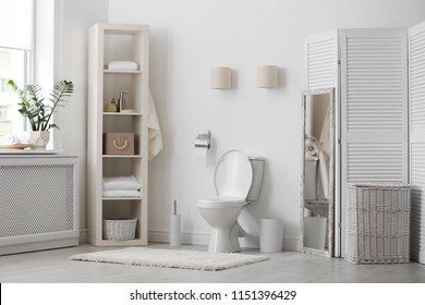 Toilet bowl in modern bathroom interior - Shutterstock ID 1151396429
