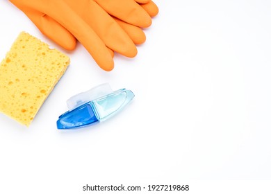 Toilet Cleaning Concept. Rubber Gloves, Cleaning Sponge And Wc Gel Freshener Applicator On White Background.