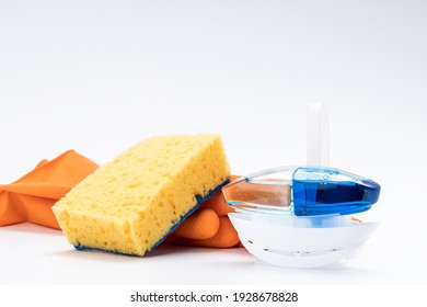 Toilet Cleaning Concept. Rubber Gloves, Cleaning Sponge And Wc Gel Freshener Applicator On White Background.