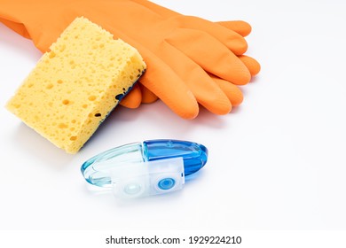 Toilet Cleaning Concept. Rubber Gloves, Cleaning Sponge And Wc Gel Freshener Applicator On White Background.