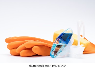 Toilet Cleaning Concept. Rubber Gloves, Cleaning Sponge And Wc Gel Freshener Applicator On White Background.