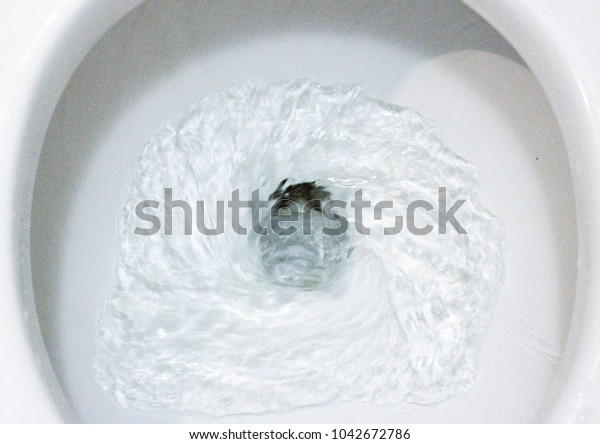 Toilet, Flushing Water, close\
up