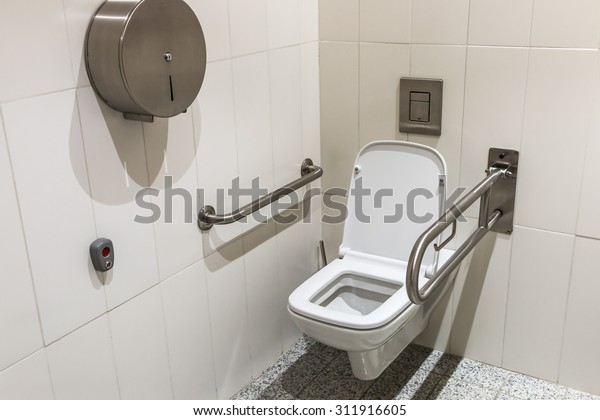 Toilet Handrails Disabled Focus On Lid Stock Photo 311916605 | Shutterstock