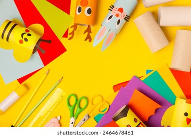 Toilet paper crafts on a colored background. Kids crafts made with toilet paper roll. DIY. Handmade. Paper toys. Origami animals. Concept of children's educational games. Place for text. Copy space. - Powered by Shutterstock