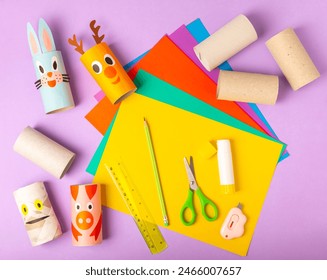 Toilet paper crafts on a colored background. Kids crafts made with toilet paper roll. DIY. Handmade. Paper toys. Origami animals. Concept of children's educational games. Place for text. Copy space. - Powered by Shutterstock