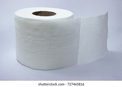 Toilet paper isolated over a grey background