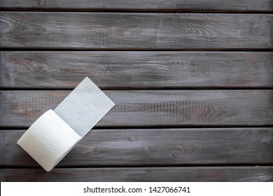 Toilet Paper Roll On Wooden Background Top View Mockup